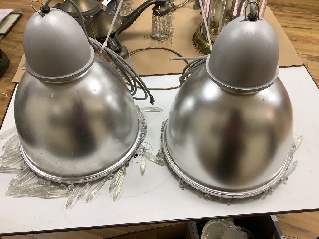 A pair of industrial style lustre hung lamps